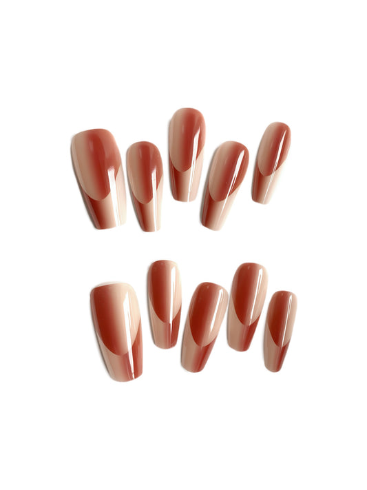 Autumn Glow almond-shaped press-on nails in nude and burnt orange design by Comfytip