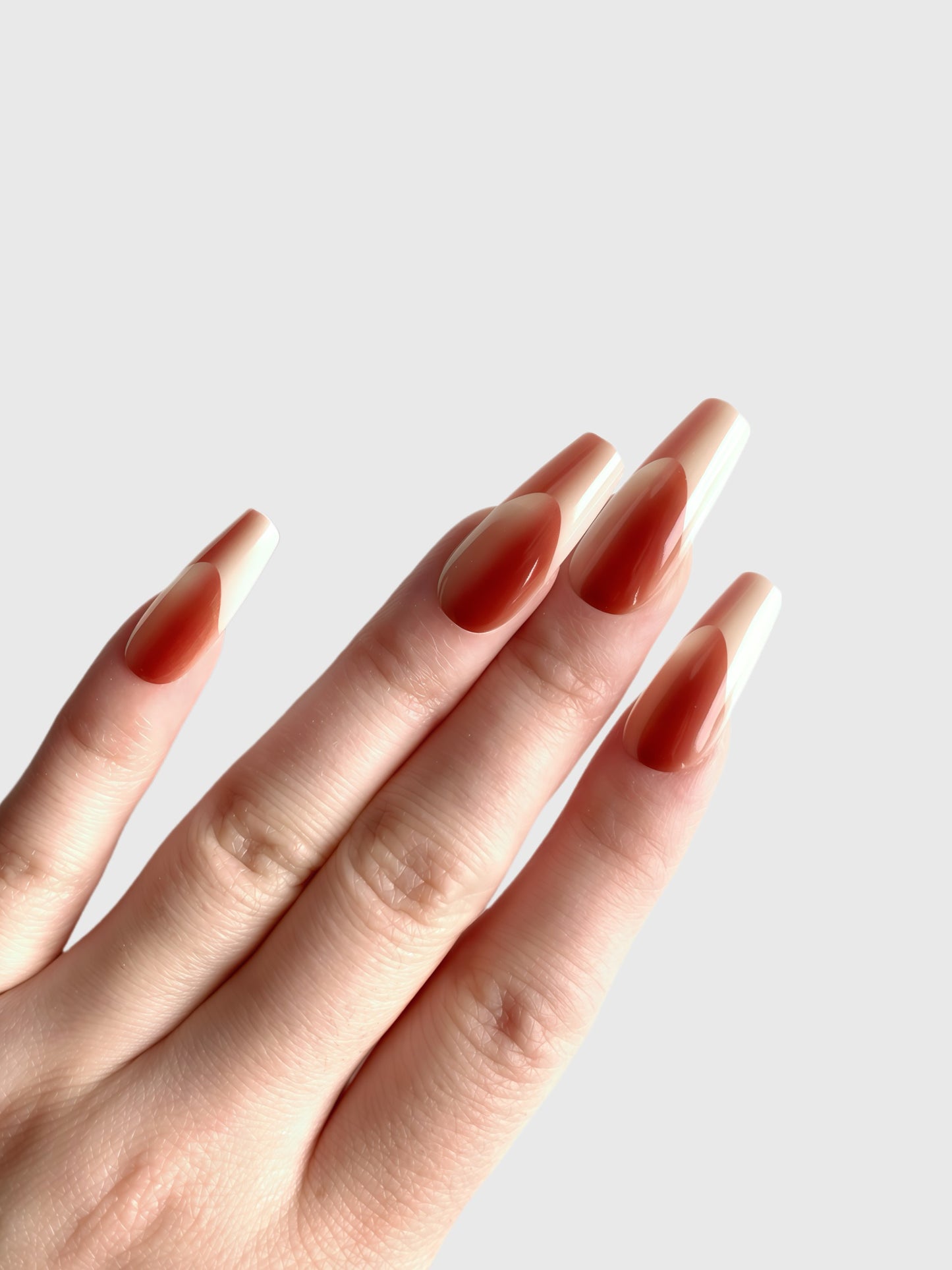 Autumn Glow almond-shaped press-on nails in nude and burnt orange design by Comfytip
