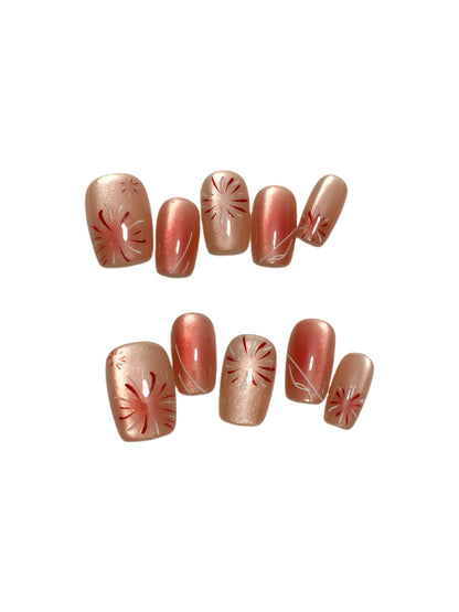 Sunset Sparkle peach coral glitter press-on nails with red floral firework design by Comfytip